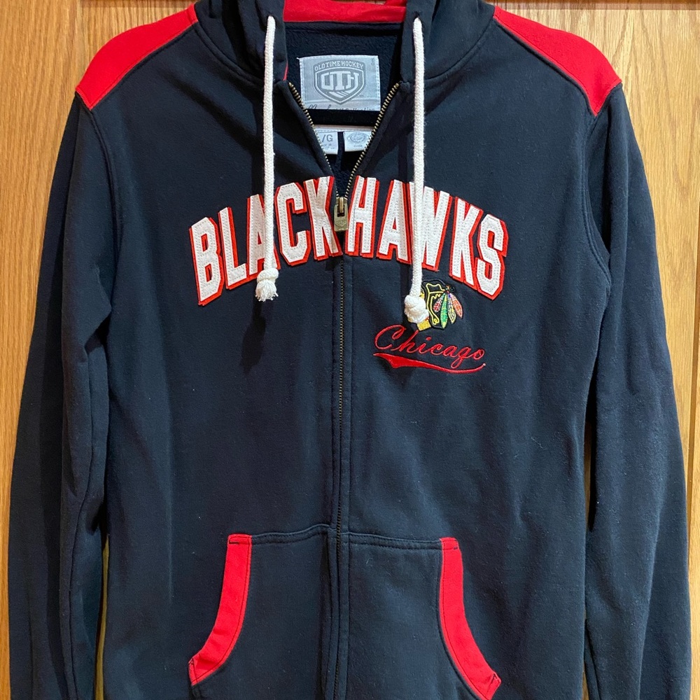 Old time hockey NHL women’s Chicago Blackhawk’s black hoodie, size large.